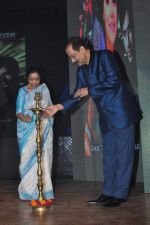 Asha Bhosle & Subrata Roy Lighting the Lamp at Krishendu sen album launch in Mumbai on 21st Aug 2012.jpg